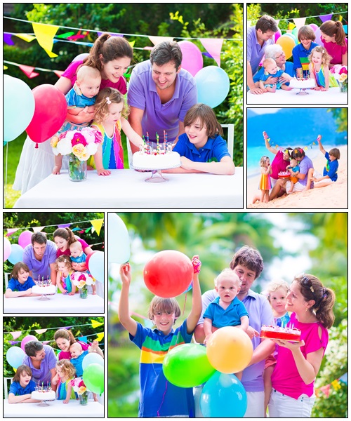 Happy family at birthday party - Stock Photo