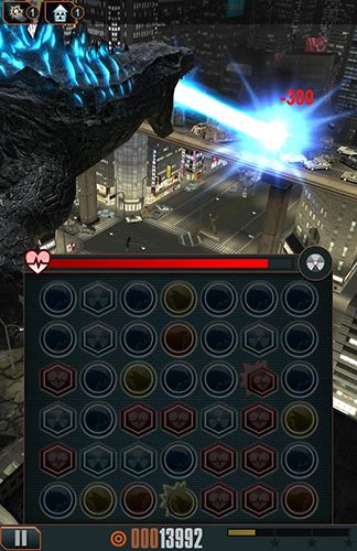 Captures d'écran du jeu Godzilla: Smash 3 téléphone Android, une tablette.